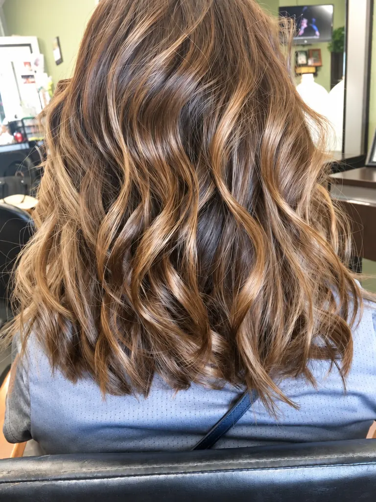 Chocolate-brown waves with caramel highlights, back view